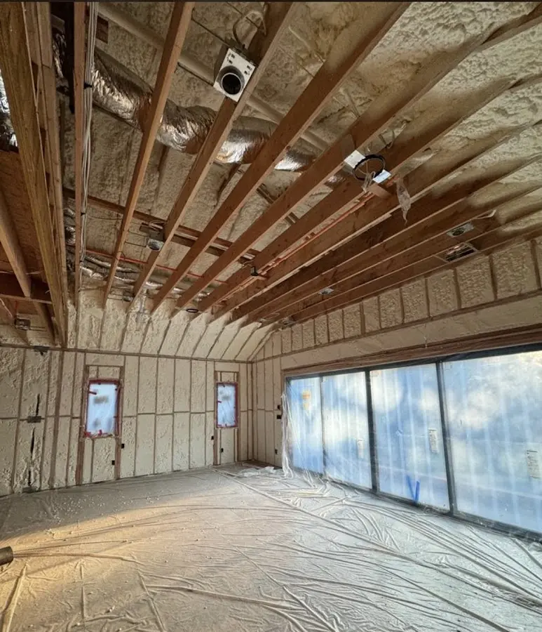 Interior walls and ceiling insulated with spray foam during new construction in Ware